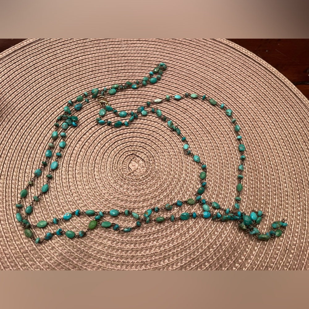 Turquoise bead wire strand with clasp.